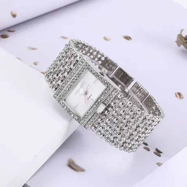 ساعت مچی عقربه ای زنانه ویوگز مدل لاکچری کد wown1